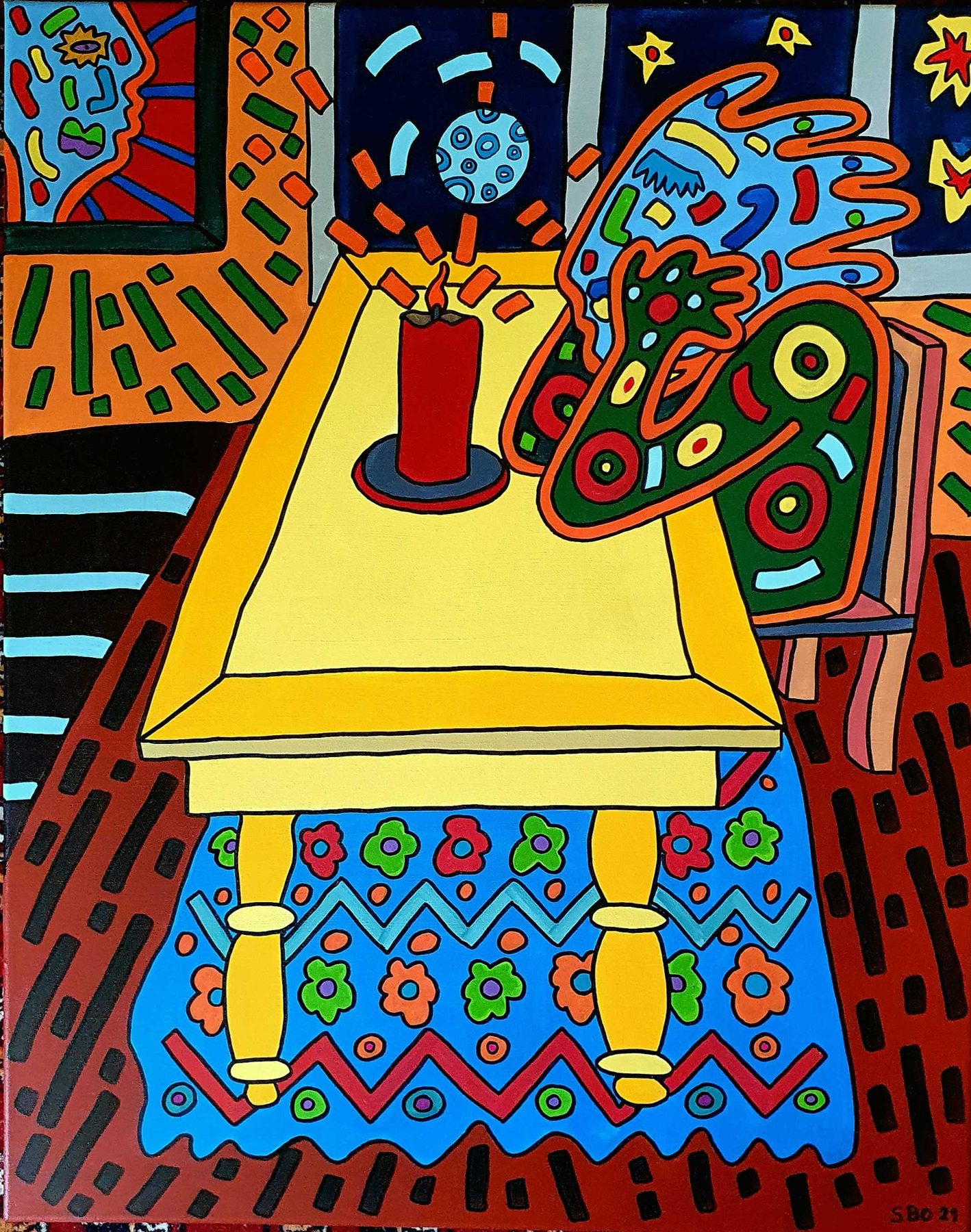 Table jaune, bougie rouge et tapis fleuri